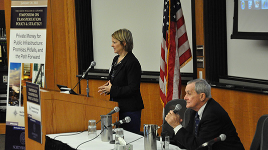 Ann Schneider and William O. Lipinski address the crowd at the Lipinski Symposium on Transportation Policy & Strategy.