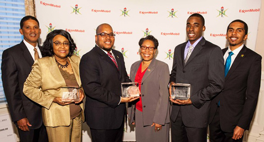 The National Society of Black Engineers (NSBE) and ExxonMobil honored three universities with the 2013 Impact Award. Pictured left to right: Kenny Warren, ExxonMobil; Minnie McGee, Ohio State University; Antoine Baines, University of Michigan; Congresswoman Marcia Fudge, U.S. House of Representatives - Ohio; Andy Nwaelele, vice president of Northwestern's NSBE chapter; and Calvin Young of NSBE.