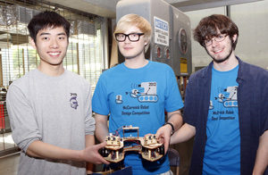 First-place winners “Aperture Robotics,” with team members (left to right) Kevin Ye, Georgiy Mazin, and Seth McCammon