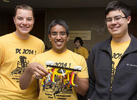 Members of Team Jankbot Rises (from left: Stefan Hyde, Nikhil Holay, and Jorge Solis) show off their winning design.