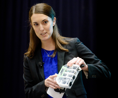 Ampér's Carolyn Snider presents a prototype of the team's smart circuit breaker.