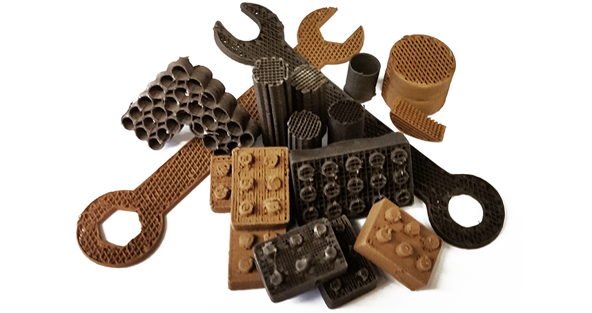 Tools and building blocks made by 3D printing with lunar and Martian dust.
