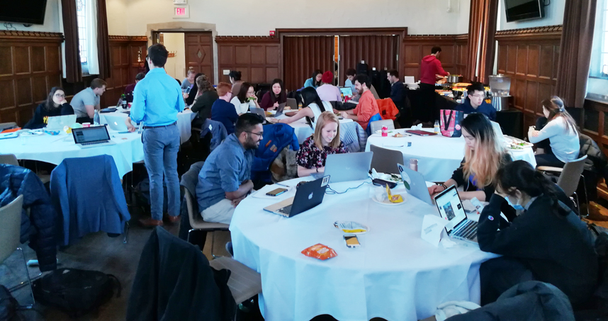 Students work in interdisciplinary teams during the hackathon.
