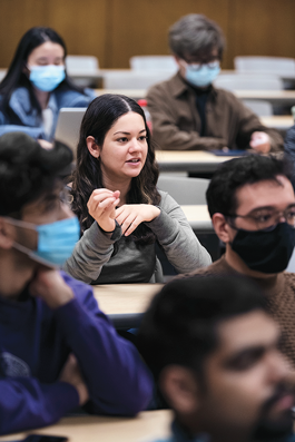 Computer science students participating in a class discussion