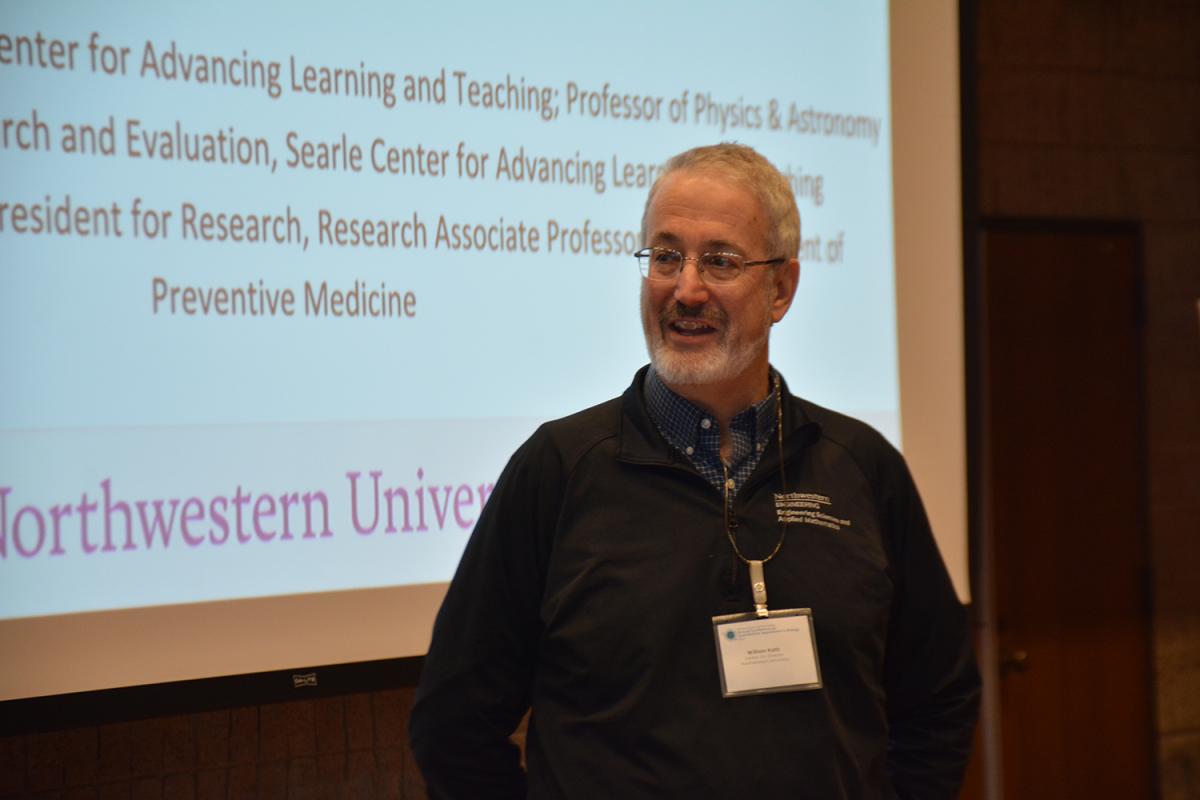 William Kath, co-director of Northwestern’s NSF-Simons Center for Quantitative Biology and a professor of engineering sciences and applied mathematics, introduces attendees to Bennett Goldberg, Denise Dran, and Fruma Yehiely, who led a workshop on team science.