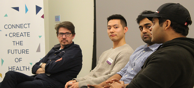 Prof. Hammond and MSAI student participate in a discussion with prospective students.