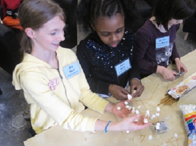 Girls Making Spaghetti and Marshmallow Towers