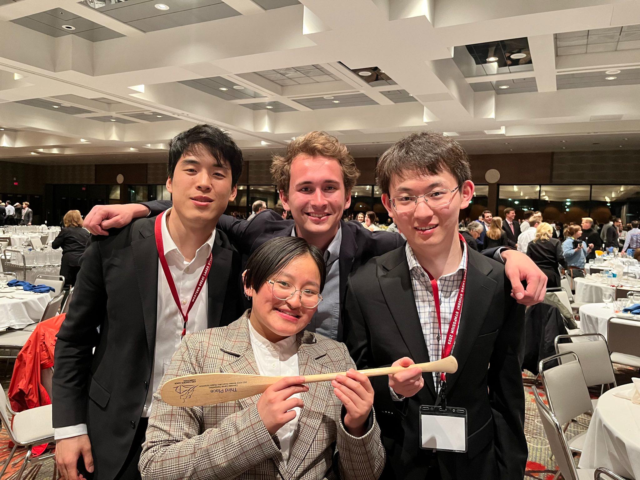 From left to right: Hans Xu, David Venator, Jazmyn Lu, and Davy Zeng hold the award for 3rd place. 