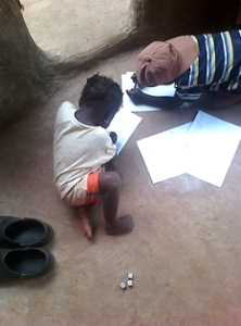 Children writing on paper
