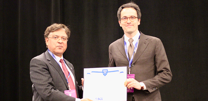 Professor Alessandro Rotta Loria, right, accepts the 2025 Leonardo Da Vinci Award.