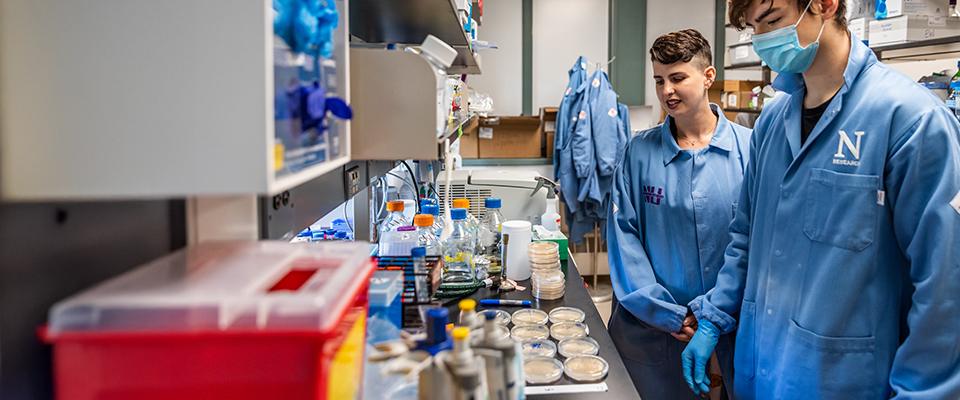 Erica Hartmann and student in lab
