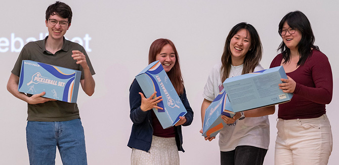 Outfitted team: Jeffrey Ryan (L), Jasmine Meyer, Hannah Zhao, and Alison Bai