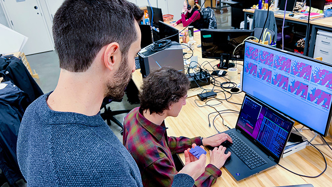Professor Sam Kriegman collaborates with a PhD student