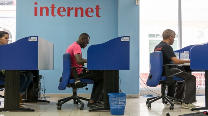 Cuban Residents Connect at a Local Internet Cafe