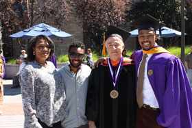 Izaiah Hakim Wallace & family are congratulated by Dr. Sahakian