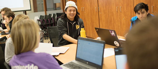 Haoqi Zhang works with EDI students in the DSGN 401-2: Human-Centered Design Studio 2 course.