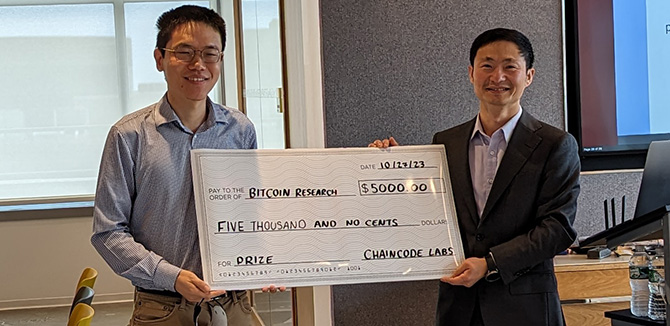 Dongning Guo (r) and collaborator Ling Ren (l) were awarded the 2023 Bitcoin Research Prize