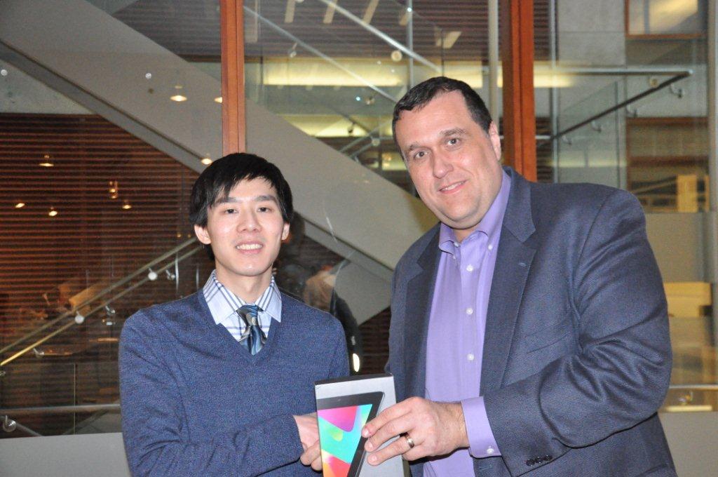 James Du receiving his Nexus 7 Wifi Tablet from Professor Werwath.