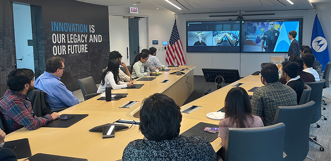 Vasani on a behind-the-scenes tour at Motorola Solutions with classmates from Northwestern's Master of Engineering Management (MEM) program