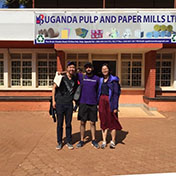 Caleb, with other Northwestern students, in front of the Uganda Pulp & Paper Mill