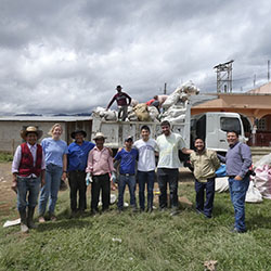 Kwon working with the La Pista community on trash collection