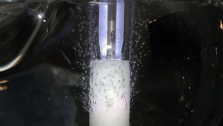 Close-up of bubble reactor in lab
