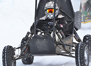 A member of Northwestern's Baja SAE team races at a practice competition in Tennessee.