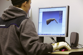 Lauren Tyndall designs a new hand splint in the the Rapidform program.