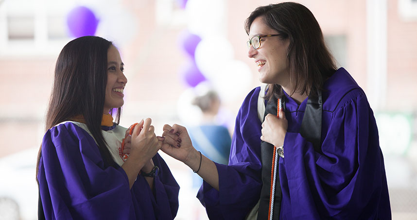 Friends celebrate their graduation after McCormick's commencement ceremony