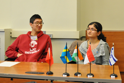 Kenneth Hua listens to Shreya Udani discuss her study-abroad project at the Post Graduate Institute for Medical Education and Research (PGIMER) in India.