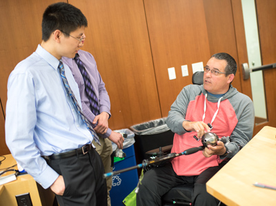 A DTC student works with a patient at the Rehabilitation Institute of Chicago.
