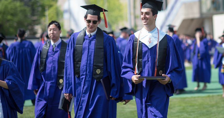 Friends celebrate their graduation after Northwestern Engineering's Undergraduate Convocation.