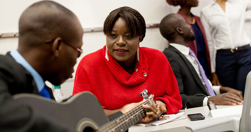 Emerson Segbedji and Kelechi Mbah sing songs during the class break.