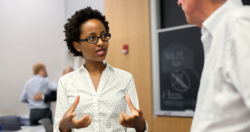 Tanzania's Nuru Muro discusses her business plan with one of the pitch judges.