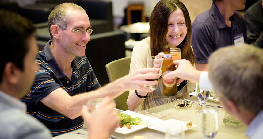 Guests enjoy the workshop's closing reception in Cohen Commons.