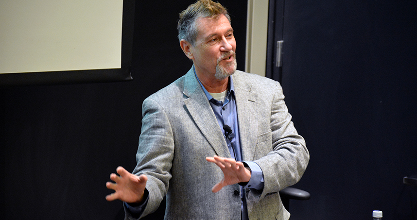 Phillip Szuromi addresses an audience in Northwestern's Pancoe Abbott Auditorium. Credit: Roger Anderson