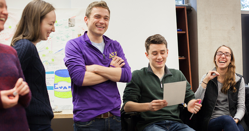 Evan Witort (middle) laughs with his classmates.