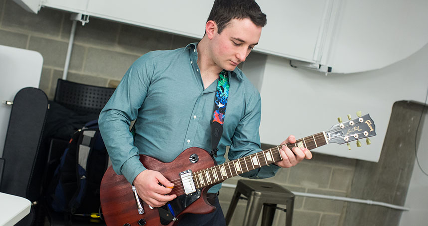 Junior Gabriel Pinkus presented a guitar for which he completed all of the electronic design.