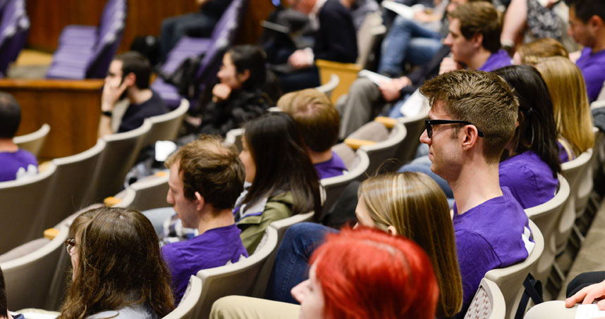 Audience members listen to opening remarks and the keynote talks in the Norris University Center.
