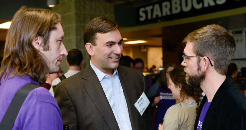 Northwestern's Julius Lucks, Milan Mrksich, and Michael Jewett mingle at the retreat's reception.