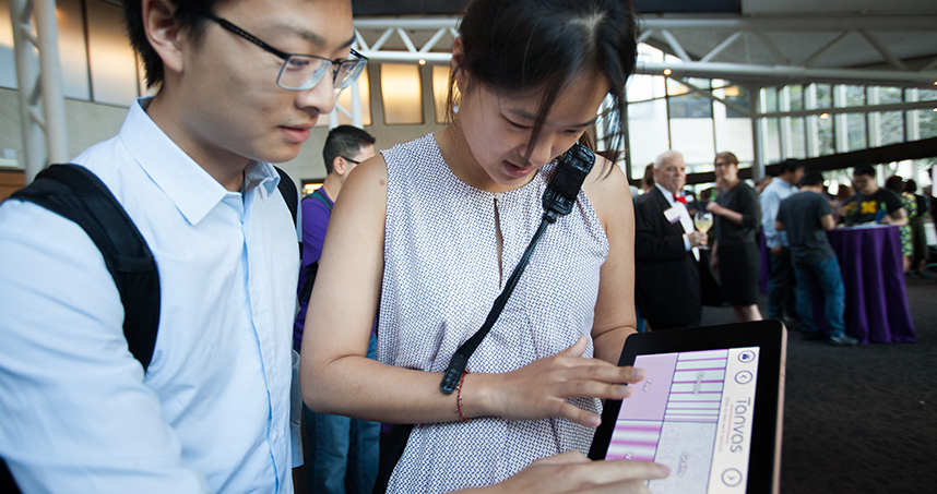 Guests at the demo session feel different textures on one of Tanvas' haptics technology devices.