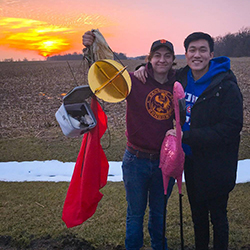 Members of the NSET team retrieve their weather balloon.