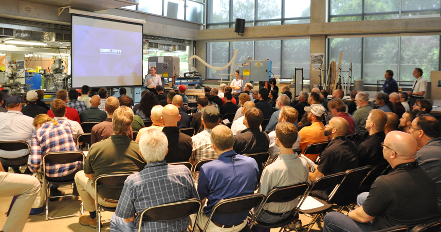 Segal Design Institute Operations Director Joe Kuechel speaks to university shop managers. Credit: Alex Gerage