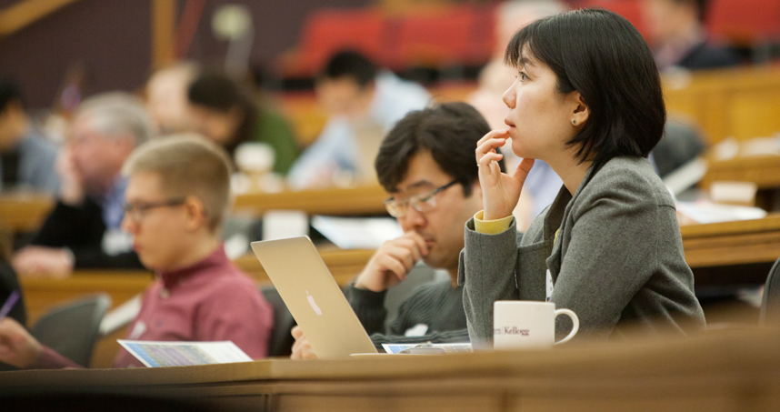 Attendees listen to energy experts during the Symposium on Microgrids on April 10.