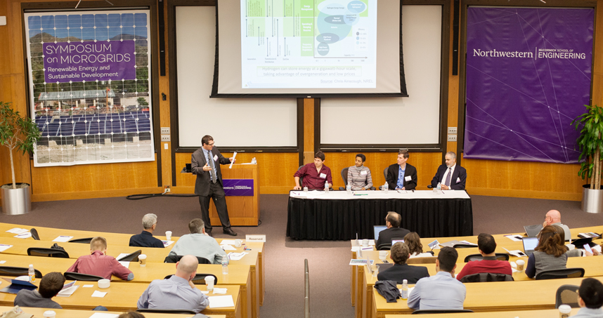 Professor Adilson Motter leads a panel discussion on technical barriers to microgrids.