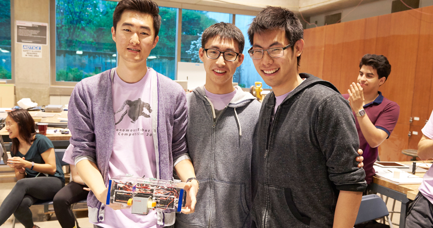 Winning team (left to right): Simon Zhao, Eric Hao, and Sean Ye