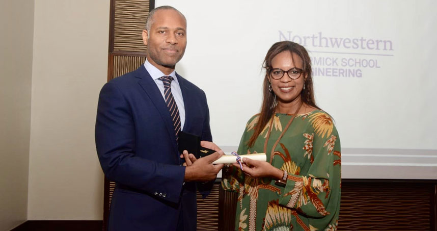 Professor Guillermo Ameer receives the Key to Panama City, Panama, from Vice Mayor Raisa Banfield.