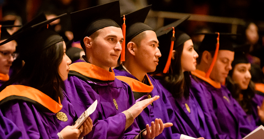Graduates applaud during the MS and PhD commencement ceremony in Pick-Staiger. Credit: Joel Wintermantle