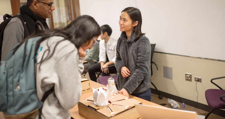 A student presents her project at the Design Expo.