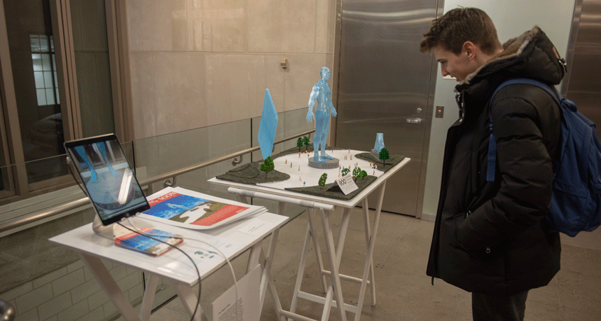 "Their Weight in Water" shows model sculptures reflecting water required to make products like shoes or an iPad.